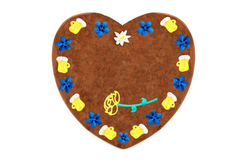 Oktoberfest Gingerbread heart cookie with ornaments and copy space