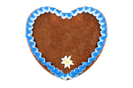Oktoberfest Gingerbread heart cookie with ornaments and copy space