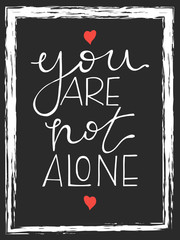 You are not alone lettering. Hand drawn vector illustration, design, greeting card, logo