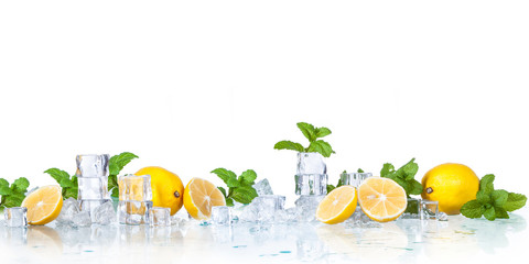 ice cubes, mint leaves with lemons isolated on a white background - obrazy, fototapety, plakaty