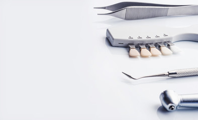 Side view of dental tools with copy space on white background