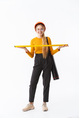 Full length of an attractive young woman architect