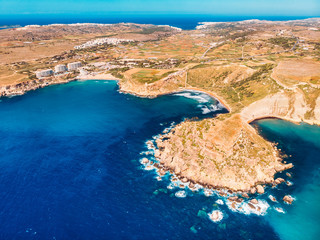 Ghajn Tuffieha Golden bay on Malta island, aerial top view