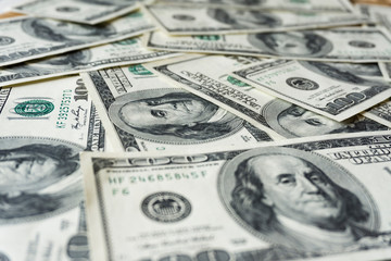 Pile of old one hundred dollar bills bills, close up dollars