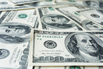 Pile of old one hundred dollar bills bills, close up dollars