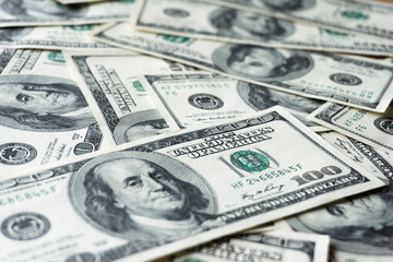 Pile of old one hundred dollar bills bills, close up dollars