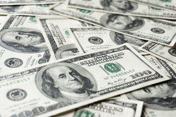 Pile of old one hundred dollar bills bills, close up dollars