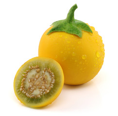 Yellow eggplant,cock roach berry,Dutch eggplant,Indian Nightshade  with cut in half isolated on white background