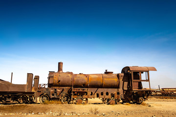 Old rusty steam locomotives near Uyuni in Bolivia. Cemetery trains.