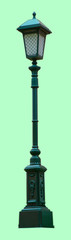 Green lamppost on a light green background. Isolate