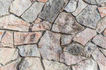 Obraz premium abstract background of pink and gray stone wall close up