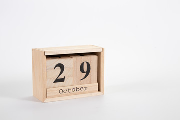 Wooden calendar October 29 on a white background