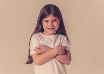 Fototapeta premium Portrait of a beautiful clever child with a happy, cheerful face looking confident. Human emotions