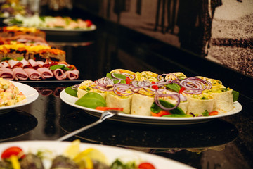 Mouth-watering,colorful dishes on the table.Delicious meat snacks