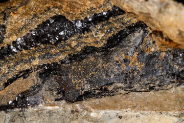 macro mineral fluorite stone on black background