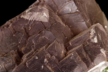macro mineral fluorite stone on black background