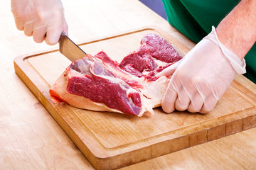Separation of a raw mutton meat with rib