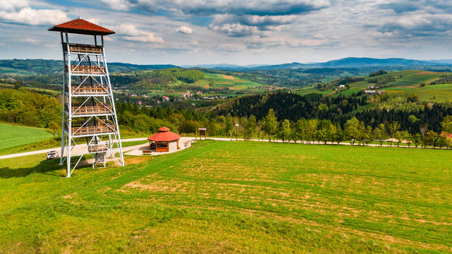 Viewing tower in Brusnik,Poland overlooking rural countryside,aerial view
