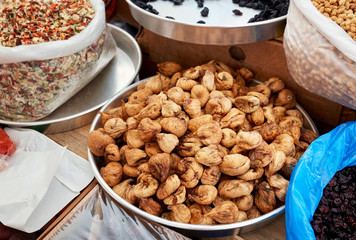 Dried fig in a pan on the market counter 
