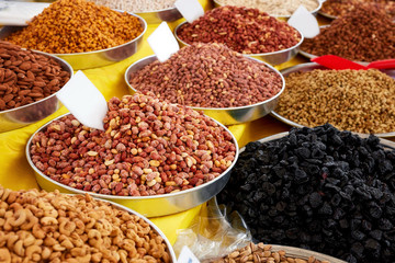 Various dried fruits on the counter of an authentic bazaar