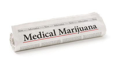 Rolled newspaper with the headline Medical marijuana