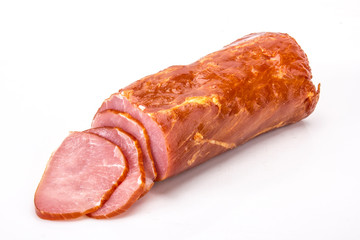 Pork tenderloin. Cold meat on a white background.