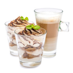 Classic tiramisu dessert in a glass and cup of coffee isolated on a white background with clipping path