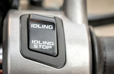 Idling Stop System Switch on a Motorcycle.