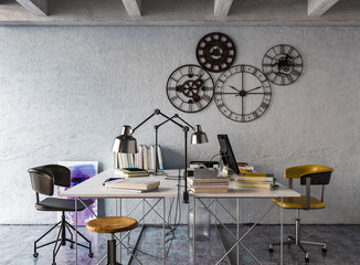 Ausschnitt eines Büros mit Schreibtisch vor grauer Wand