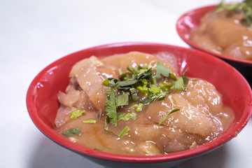 Bawan (Ba wan), taiwanese meatball delicacy, delicious street food, fried starch wrapped round shaped dumpling with pork inside, close up, copy space