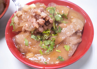 Bawan (Ba wan), taiwanese meatball delicacy, delicious street food, fried starch wrapped round shaped dumpling with pork inside, close up, copy space