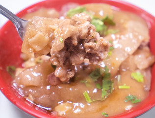 Bawan (Ba wan), taiwanese meatball delicacy, delicious street food, fried starch wrapped round shaped dumpling with pork inside, close up, copy space