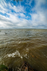 lake or sea beach in stormy weather