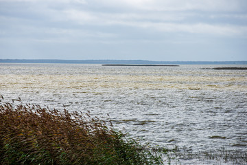 lake or sea beach in stormy weather