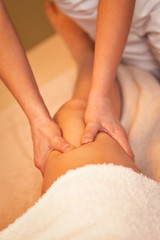 Obraz na płótnie Canvas close up of a leg massage