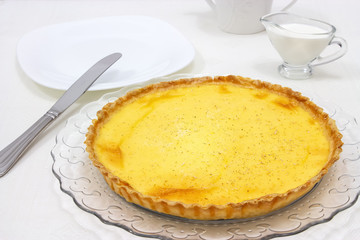 Sweet custard tart or lemon pie white background. Selective focus. Close up.