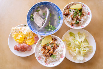 Braised pork over rice - Taiwan famous traditional street food delicacy. Soy-stewed pork on rice. Travel design concept. Top view,copy space,close up
