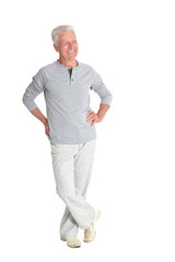 Senior man posing isolated on white background, full length