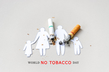 Paper cut of family destroyed by cigarettes. Drugs destroying family concept. Quit smoking for life...