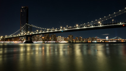 Fototapeta na wymiar Manhattan by night, from DUMBO, Brooklyn