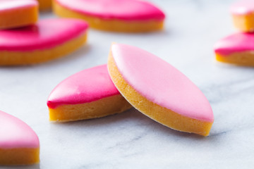Calissons, traditional French Provence sweets on marble table background. Close up.