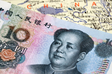 Yuan on the map of China. Concept for chinese economy, investment and trading in Asia