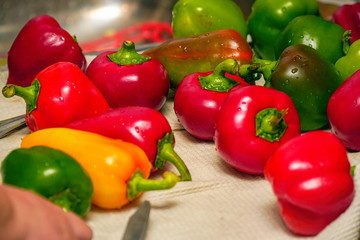 Bell peppers on a white towel in the kitchen