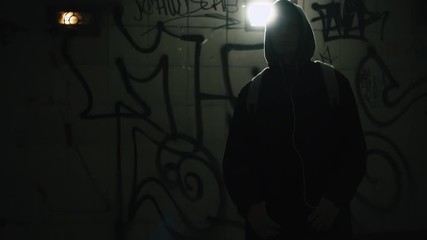 Portrait Gang Member Looking Menacingly into Camera