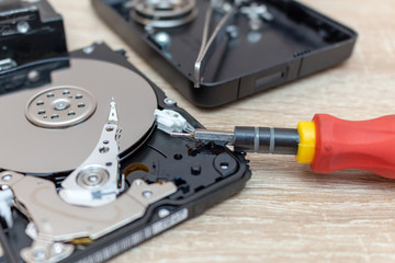 old broken hard disk drives composition in a repair recovery service