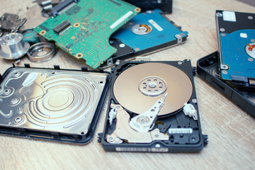 old broken hard disk drives composition in a repair recovery service