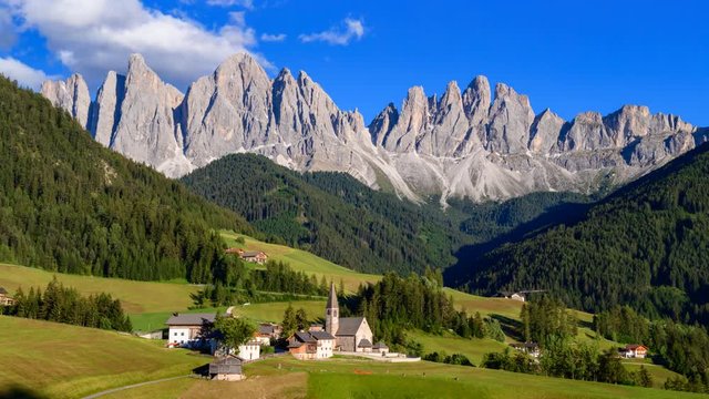 4K Time lapse of Odle mountain with church of Santa Maddalena, Dolomites, Italy