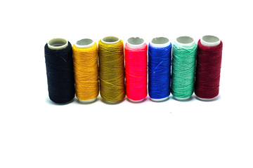 Multicolor threads on white background