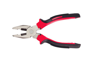 One new metal pliers with rubber handles black and red color isolated on white background. Top view. Repair or building concept