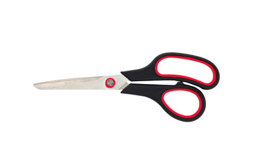 One new clean sharp metal scissors with handles of black and red colors isolated on white background. Clipping path. Top view